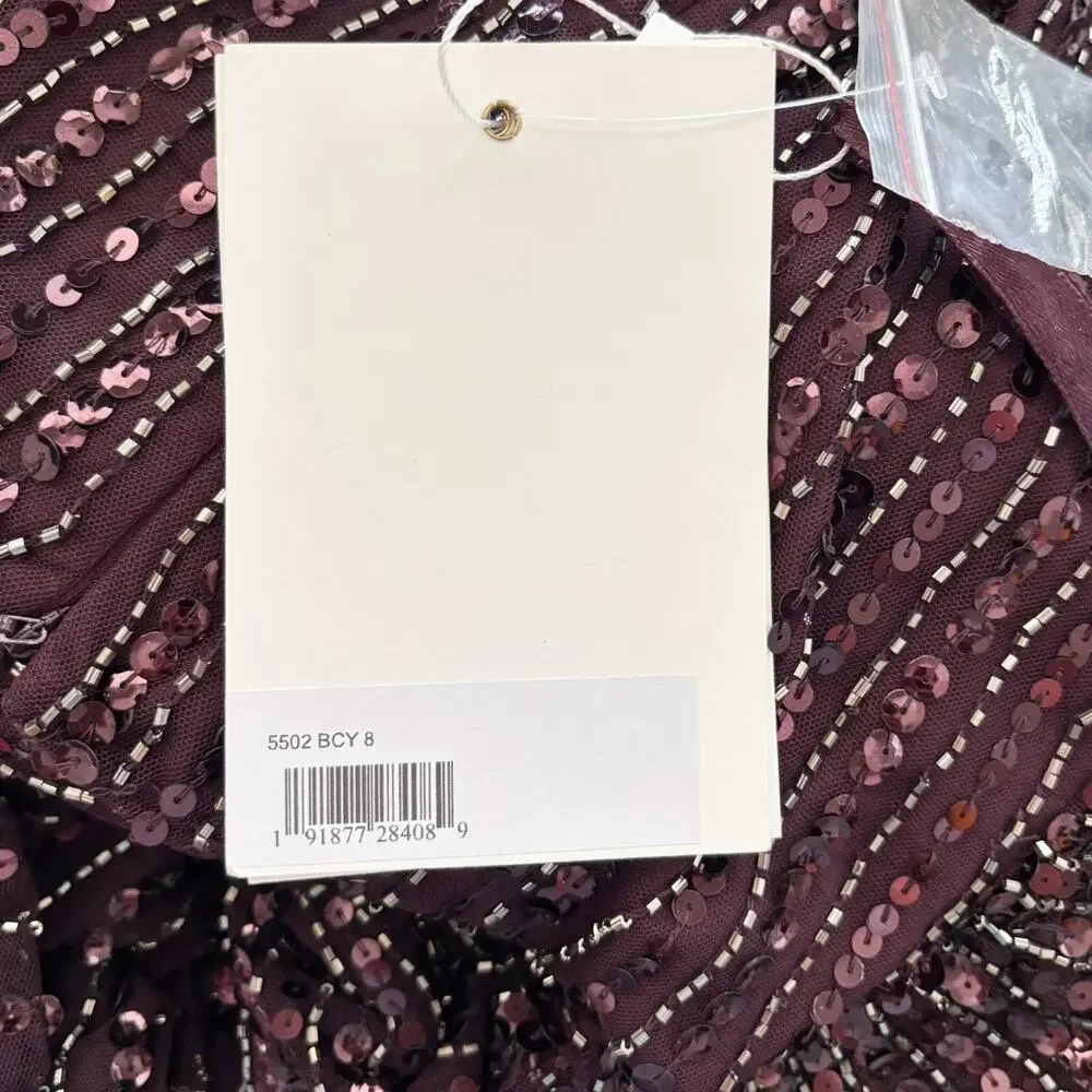 Mac Duggal new tag